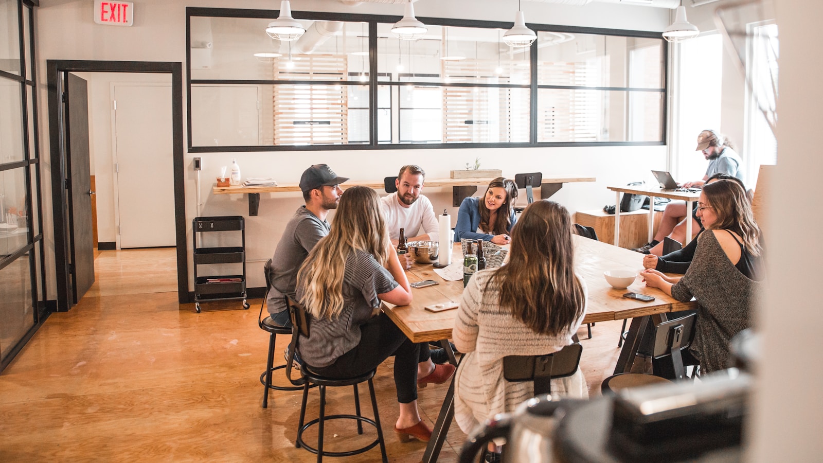 talking people sitting beside table, business